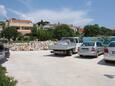 Parking lot Murter, Murter, Parking lot 5100 - Apartments with pebble beach.