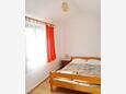 Спальня 1 Murter, Спальня 1 в размещении типа apartment, Домашние животные допускаются и WiFi.