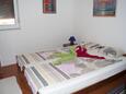 Slaapkamer Murter, Slaapkamer in the apartment, (pet friendly) en WiFi.