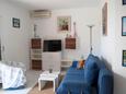 Living room Murter, Living room in the apartment, air condition available, (pet friendly) and WiFi.