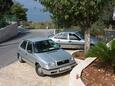 Parking lot Postira, Brač, Parking lot 5152 - Apartments near sea with pebble beach.