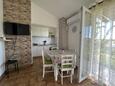 Maslinica, Dining room in the apartment, air condition available, (pet friendly) and WiFi.