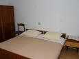 Podgora, Bedroom 1 in the apartment, air condition available and WiFi.