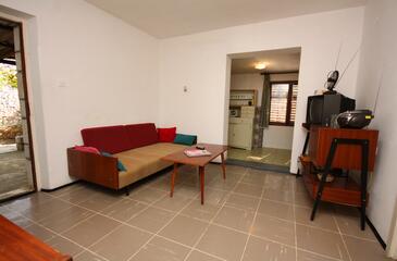 Nečujam, Woonkamer in the apartment, air condition available en (pet friendly).