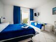 Selce, Ložnice v ubytování typu studio-apartment, s klimatizací a WiFi.