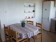 Podstrana, Comedor in the apartment, air condition available y WiFi.