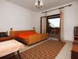 Спальня Trogir, Спальня в размещении типа studio-apartment, доступный кондиционер, Домашние животные допускаются и WiFi.