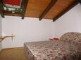 Спальня 3 Podgora, Спальня 3 в размещении типа apartment, WiFi.