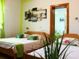 Bedroom Omiš, Bedroom in the apartment, air condition available and WiFi.