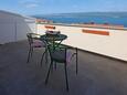 Vrbnik, Terrasse dans l’hébergement en type room, avec la vue sur la mer et WiFi.