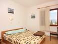 Vrbnik, Bedroom in the room, air condition available and WiFi.