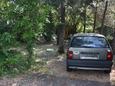 Parking lot Njivice, Krk, Parking lot 5324 - Apartments with pebble beach.