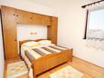 Спальня 1 Punat, Спальня 1 в размещении типа apartment, WiFi.