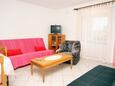 Obývací pokoj Punat, Obývací pokoj v ubytování typu apartment.