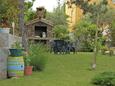 Baška, Krk, Courtyard 5330 - Apartments with pebble beach.