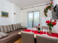 Obývací pokoj Baška, Obývací pokoj v ubytování typu apartment, s klimatizací a WiFi.