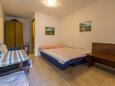 Spavaća soba Selce, Spavaća soba u smještaju tipa studio-apartment.