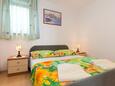 Ložnice Punat, Ložnice v ubytování typu apartment, domácí mazlíčci povoleni a WiFi.