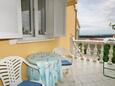 Terrace Punat, Terrace in the apartment, with a sea view and WiFi.