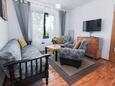 Living room Punat, Living room in the apartment, air condition available, (pet friendly) and WiFi.