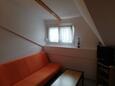 Njivice, Woonkamer in the apartment, air condition available en WiFi.