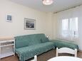 Living room Punat, Living room in the apartment, air condition available, (pet friendly) and WiFi.