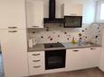 Punat, Kitchen in the apartment, (pet friendly) and WiFi.