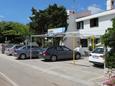 Parking lot Punat, Krk, Parking lot 5419 - Apartments near sea with pebble beach.