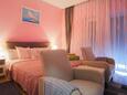 Ložnice Malinska, Ložnice v ubytování typu studio-apartment, s klimatizací a WiFi.
