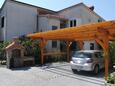 Parking lot Krk, Krk, Parking lot 5461 - Apartments with pebble beach.