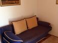 Selce, Sala de estar in the apartment, air condition available y WiFi.