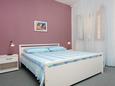 Ložnice Postira, Ložnice v ubytování typu apartment, domácí mazlíčci povoleni a WiFi.