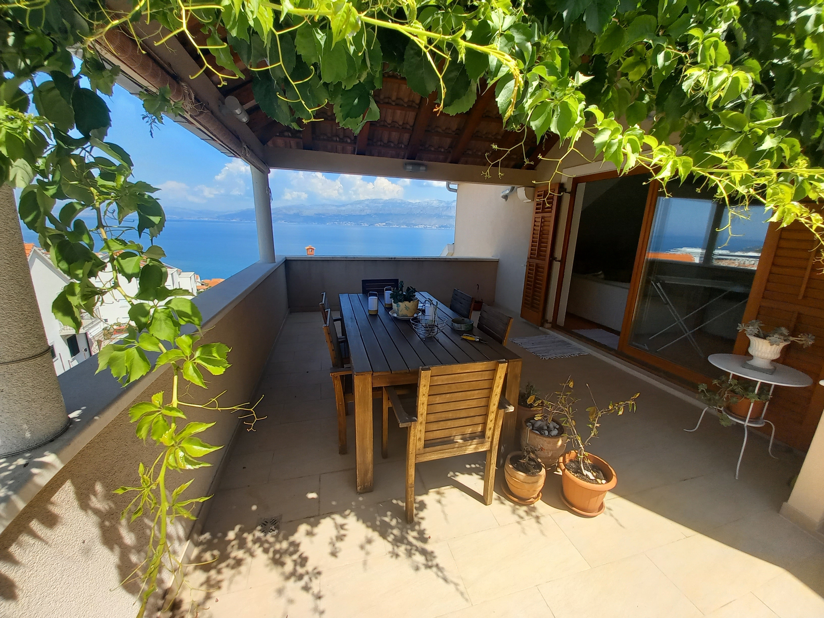 Three bedroom apartment with terrace and sea view Postira, Brač  A-i