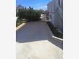 Parking lot Sumartin, Brač, Parking lot 5619 - Apartments near sea with pebble beach.