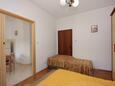 Sumartin, Ložnice v ubytování typu apartment, s klimatizací a WiFi.