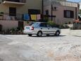 Parking lot Supetar, Brač, Parking lot 5628 - Apartments with pebble beach.