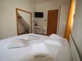 Ložnice Sumartin, Ložnice v ubytování typu room, s klimatizací a WiFi.