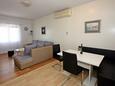 Dining room Supetar, Dining room in the apartment, air condition available, (pet friendly) and WiFi.