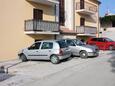Parking lot Supetar, Brač, Parking lot 5663 - Apartments with pebble beach.