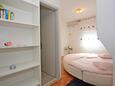 Supetar, Bedroom 3 in the apartment, air condition available and WiFi.