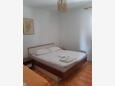 Bedroom Supetar, Bedroom in the apartment, air condition available, (pet friendly) and WiFi.