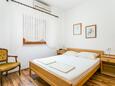 Bedroom 1 Supetar, Bedroom 1 in the apartment, air condition available, (pet friendly) and WiFi.