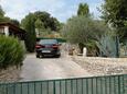 Parkiralište Škrip, Brač, Parkiralište 5673 - Kuća za odmor sa šljunčanom plažom.