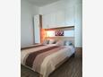 Ložnice 1 Turanj, Ložnice 1 v ubytování typu apartment, domácí mazlíčci povoleni a WiFi.