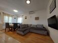 Living room Nin, Living room in the apartment, air condition available, (pet friendly) and WiFi.