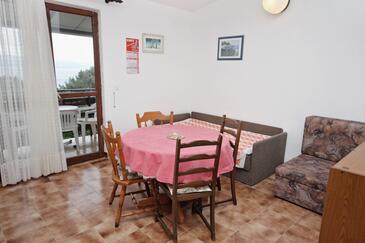 Nemira, Dining room in the apartment, air condition available and WiFi.