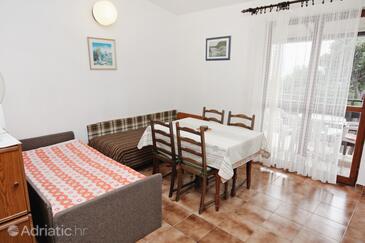 Nemira, Dining room in the apartment, air condition available and WiFi.
