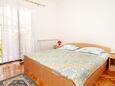 Ložnice Sukošan, Ložnice v ubytování typu apartment, s klimatizací a WiFi.