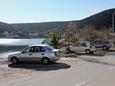 Parking lot Vinišće, Trogir, Parking lot 5980 - Apartments near sea with pebble beach.