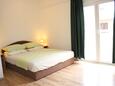 Ložnice Slatine, Ložnice v ubytování typu studio-apartment, s klimatizací a WiFi.